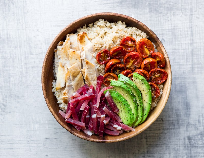 Avocado, grilled chicken breast, cherry tomato confit, crispy speck and quinoa bowl